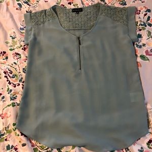 mint colored shirt